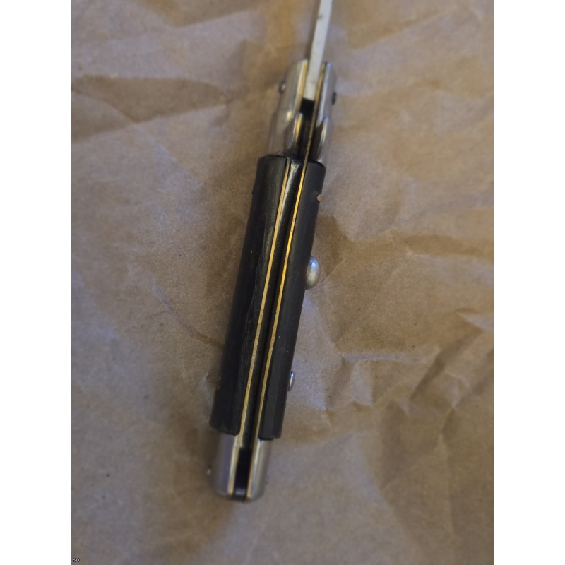 7" Inox Italian swivel bolster horn auto switchblade knife.