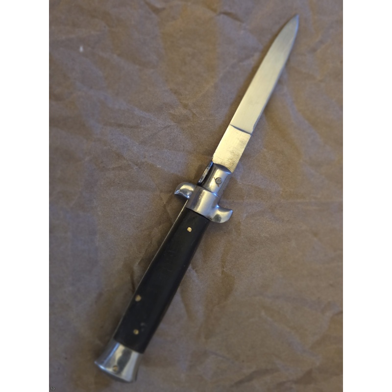 7" Inox Italian swivel bolster horn auto switchblade knife.