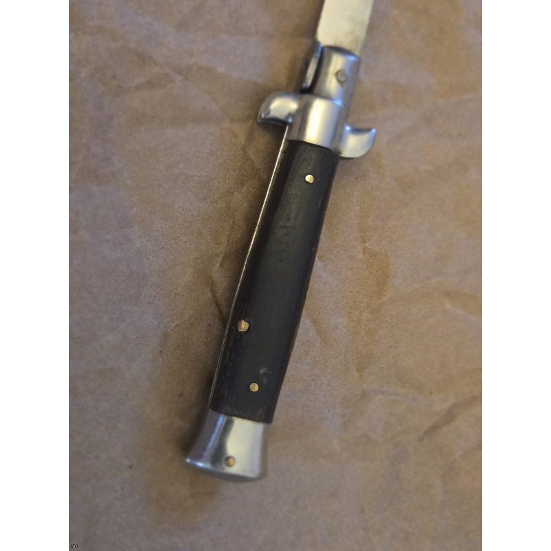 7" Inox Italian swivel bolster horn auto switchblade knife.
